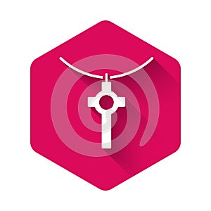 White Christian cross on chain icon isolated with long shadow. Church cross. Pink hexagon button. Vector Illustration