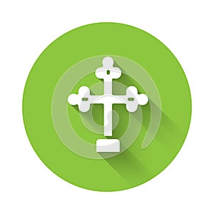 White Christian cross icon isolated with long shadow. Church cross. Green circle button. Vector
