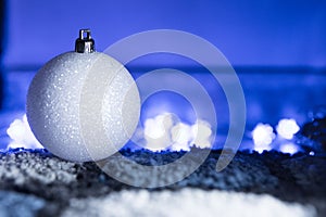 White Christmas Ball in Blue Ambient Light