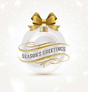 White Christmas bauble with golden bow ribbon and Christmas greeting with glitter gold flourishes elements.