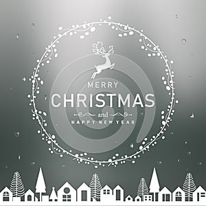 White Christmas decoration banner with garland, city on forest blur background.