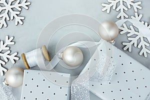 White Christmas Decoration Ornaments Frame Composition Gift Boxes Balls Snow Flakes Silk Swirl Ribbon Poster Banner Template
