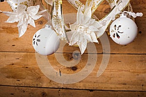 White  christmas  decorations hanging over wooden  background