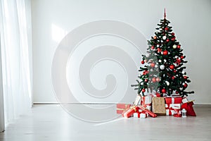 White Christmas home interior Christmas tree red gifts new year decor festive background