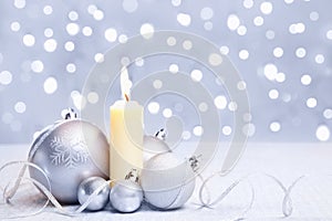 White Christmas ornament and candle