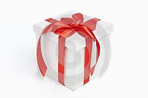 White Christmas present with red ribbon photo