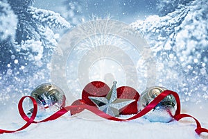 White Christmas scene with silver and red ornaments