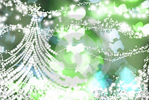 White christmas tree on green sparkly background photo