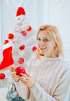White christmas tree red balls. Woman christmas happy. Glamour celebration, christmas girl santa. Christmas tree white.