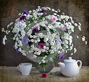 White chrysanthemums and coloured corn-flowers