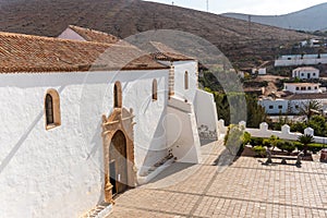 White church of Betancuria with background of a mountain, Fuerteventura, Canary Islands, Spain