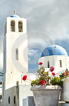 White Church with blue dome at Oia, Santorini, Greek Islands