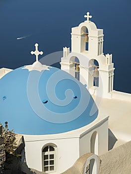 White Church with blue dome at Oia, Santorini, Greek Islands
