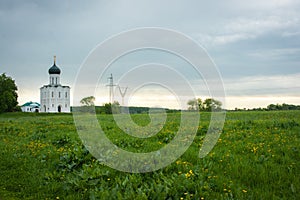White church with blue domes and scenic clouds, Russia