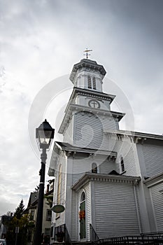 White church with a clock on its steeple