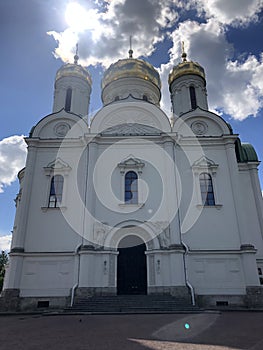 White church with golden domes