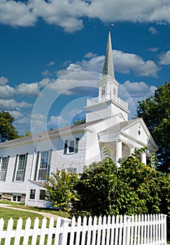 White Church Past Picket Fence