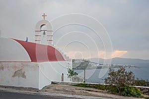 White church, red roof, Mikonos, Greece photo