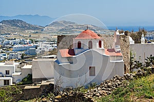 White church with red roof on Mykonos island, Greece