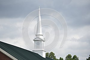 White Church Steeple with Storm Clouds