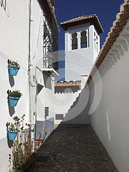 White Church Steeple and Walkway in  Albaicin Granada Spain