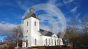 White church of Sveg in autumn in Harjedalen in Sweden