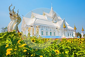 White church with Thai temple architecture