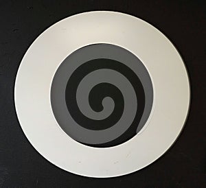 White circle on a black background. Wheel.