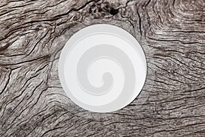 White circle paper and space for text on old wooden background