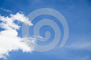 White cirro-cumulus clouds against blue sky, free space photo