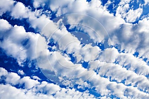 White cirrocumulus clouds blue sky background, fluffy stratocumulus cloud texture, altocumulus cloudy skies, cirrus cloudscape