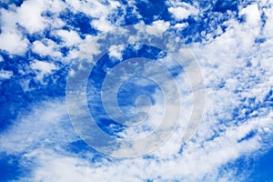 White cirrus clouds blue sky background closeup, fluffy cumulus cloud texture, cloudscape, cloudy weather, cloudiness, ozone layer