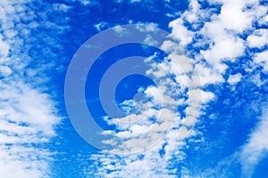 White cirrus clouds blue sky background closeup, fluffy cumulus cloud texture, cloudscape, cloudy weather, cloudiness, ozone layer