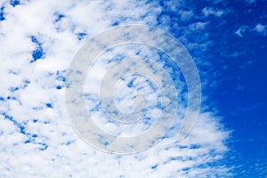 White cirrus clouds blue sky background closeup, fluffy cumulus cloud texture, cloudscape, cloudy weather, cloudiness, ozone layer