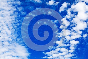 White cirrus clouds blue sky background closeup, fluffy cumulus cloud texture, cloudscape, cloudy weather, cloudiness, ozone layer