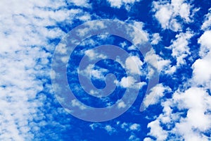 White cirrus clouds blue sky background closeup, fluffy cumulus cloud texture, cloudscape, cloudy weather, cloudiness, ozone layer