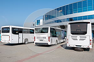 White city buses at the bus station