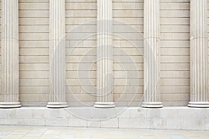 White classical columns and wall background