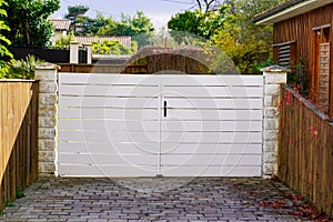White classical home door aluminum gate slats portal garden entry suburb house