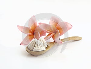White clay filler on wooden spoon for songkran festival
