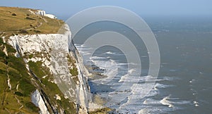 white cliffs of dover grass clear sky sea england