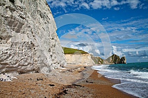 White cliffs rising above beach in southern England