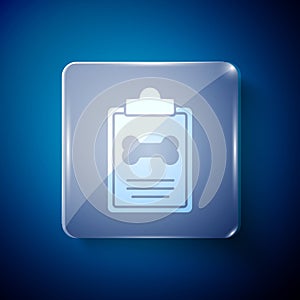 White Clipboard with medical clinical record pet icon isolated on blue background. Health insurance form. Medical check