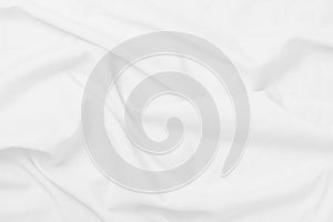 White cloth background soft wrinkled fabric patrem and surface. White colth soft background.