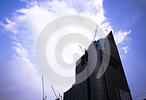 White cloud above the building.