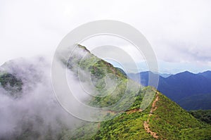 White cloud around the mountaintop photo