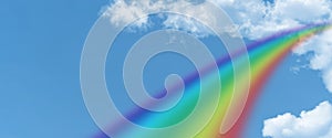 White cloud and blue sky and  rainbow background with copy space