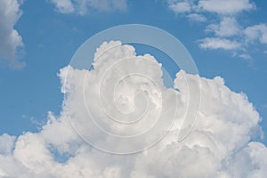 White cloud formations on the blue sky. Abstract heaven background with white clouds