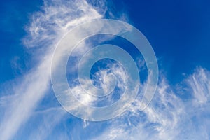 White clouds against blue sky as background