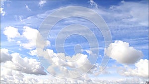 White clouds against blue sky, time lapse